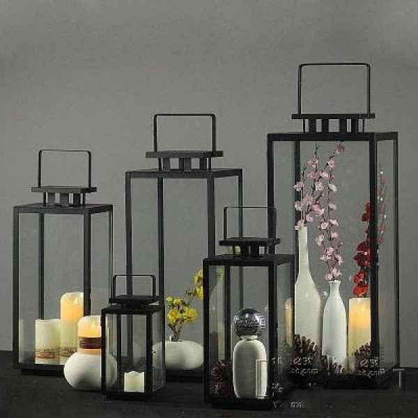 Simple modern European retro wrought iron glass candle holder outdoor windproof wind lamp portable lamp wedding props horse lamp